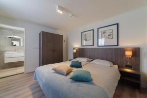 Postelja oz. postelje v sobi nastanitve Villa de Zoute Zee by Droomvilla