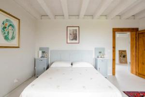Postel nebo postele na pokoji v ubytování B&B Ernestine Family Home