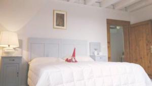 Postel nebo postele na pokoji v ubytování B&B Ernestine Family Home