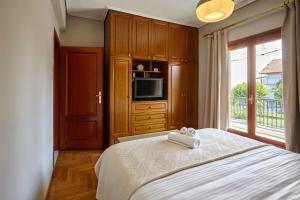 Ένα ή περισσότερα κρεβάτια σε δωμάτιο στο R House Trikala