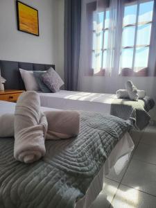 Postel nebo postele na pokoji v ubytování Azul del mar