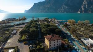 an aerial view of a resort next to a body of water at Lake House in Nago-Torbole