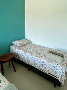 A bed or beds in a room at Pousada Abreu do Una