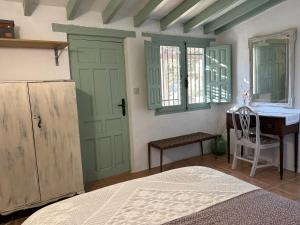 Posteľ alebo postele v izbe v ubytovaní Cortijo Vacas Gordas Villas