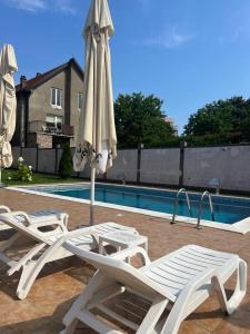 Bazén v ubytování Apartman Dobrodosli nebo v jeho okolí