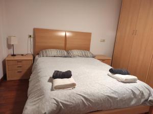 Tempat tidur dalam kamar di EL RINCÓN del TOLOÑO