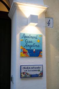a sign for a restaurant called casa angustinas at Amalfi Casa Angelina in Amalfi