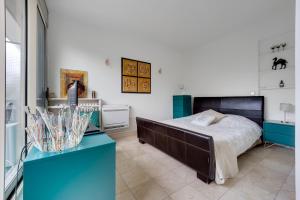 Ένα ή περισσότερα κρεβάτια σε δωμάτιο στο Bel appartement 3 pièces 2 chambres 76M2 + balcon + Parking