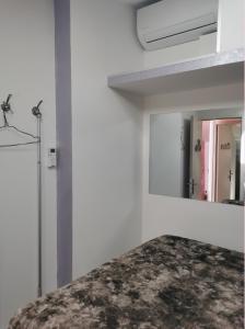 Postel nebo postele na pokoji v ubytování Chambres d'Hotes NATURISTE, Village Naturiste Cap d'Agde, Draps, Serviette, Café, Menage inclus en fin de sejour