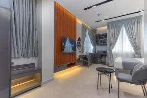 TV o dispositivi per l'intrattenimento presso GTA HOTEL IKEJA