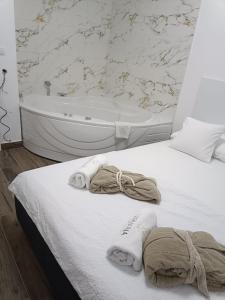 Letto o letti in una camera di Nirvana SPA Center