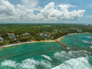 an aerial view of a beach in the ocean at BeachMirissa Hotel in Mirissa