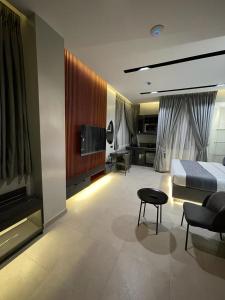 Letto o letti in una camera di GTA HOTEL IKEJA