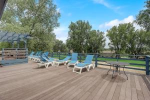 a group of chairs and tables on a deck at Destination Dells II at Tamarack Resort in Wisconsin Dells