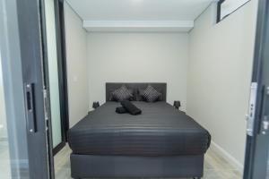 Ένα ή περισσότερα κρεβάτια σε δωμάτιο στο Bella Cabana Luxury Apartment +29 φωτογραφίες