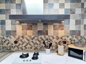 Кухня или мини-кухня в Pandora House
