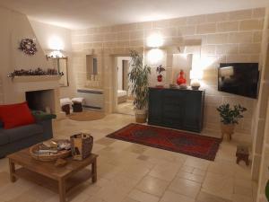 TV a/nebo společenská místnost v ubytování Casolare treggi',GGG