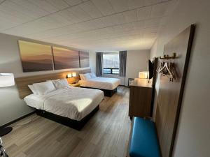 Postel nebo postele na pokoji v ubytování Days Inn by Wyndham Liberty + 21 fotografií