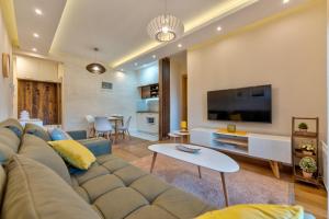 TV a/nebo společenská místnost v ubytování Exclusive Centar Peković