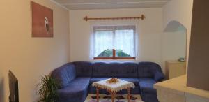 Posezení v ubytování Apartmán v centru Království sov