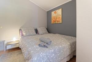 Postel nebo postele na pokoji v ubytování Apartment Ana by Rent Istria