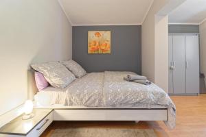 Postel nebo postele na pokoji v ubytování Apartment Ana by Rent Istria