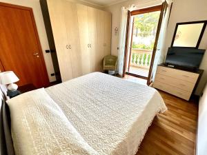 Postel nebo postele na pokoji v ubytování B&B Mariposa