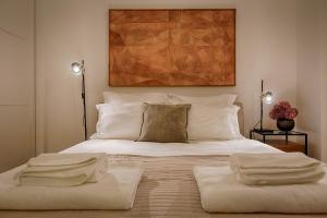 Säng eller sängar i ett rum på Master Historical Gem in Chiado