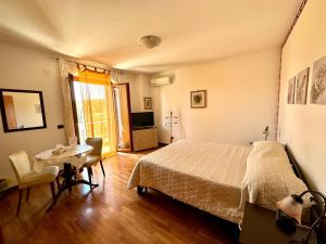 Postel nebo postele na pokoji v ubytování B&B Mariposa