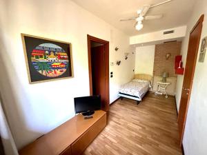 TV a/nebo společenská místnost v ubytování B&B Mariposa