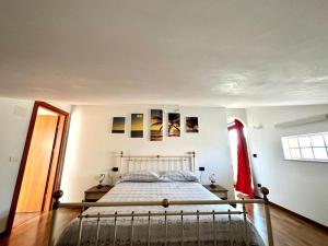 Postel nebo postele na pokoji v ubytování B&B Mariposa