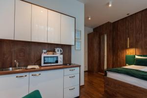 Kuchyň nebo kuchyňský kout v ubytování Studio Apartmani 071 Free Garage Parking