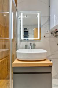 Koupelna v ubytování Apartmani MIVA + 27 fotografií