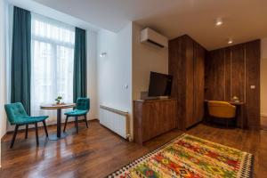 TV a/nebo společenská místnost v ubytování Studio Apartmani 071 Free Garage Parking