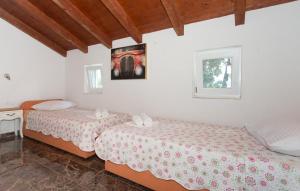 Letto o letti in una camera di Villa Brkic with large private pool and playground