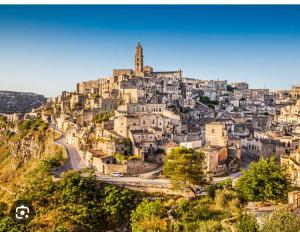 a cityscape of a town on a hill at Centralissimo 50mt in Matera