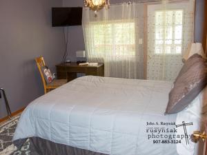 Postel nebo postele na pokoji v ubytování A Hyde Away Inn B&B