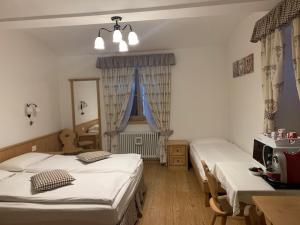 Postel nebo postele na pokoji v ubytování Bed & Breakfast SISSI