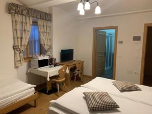 Postel nebo postele na pokoji v ubytování Bed & Breakfast SISSI