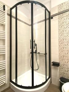 a shower with a glass door in a bathroom at addview 1 in Nafplio +44 photos