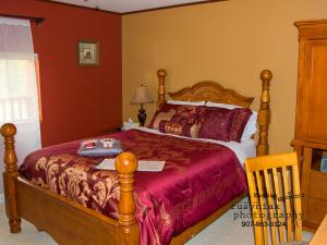 Postel nebo postele na pokoji v ubytování A Hyde Away Inn B&B