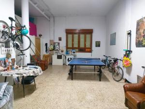 a living room with a ping pong table in it at LA RIOJA HOUSE casa entera Mesa de pinpong Parking gratuito, Chimenea, barbacoa CENTRO in Rincón de Soto