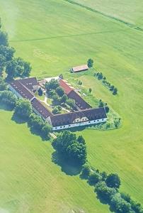 an aerial view of a building in a field at Holenský dvůr in Ratiboř