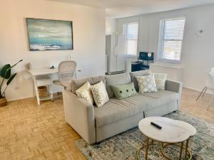 a living room with a couch and a table at New ATL Dwntwn Condo with Balcony 2 in Atlanta