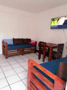 TV a/nebo společenská místnost v ubytování Confortable Suite con terrza + 4 fotografie
