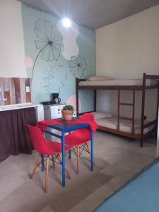Kuchyň nebo kuchyňský kout v ubytování Mar de Arraial, Suites da Ju