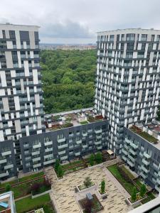 an aerial view of two tall apartment buildings at Apartments in Residence Garden Towers in Prague