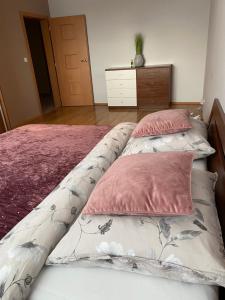Кровать или кровати в номере City Apartment