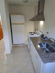 Köök või kööginurk majutusasutuses Complejo Lucero