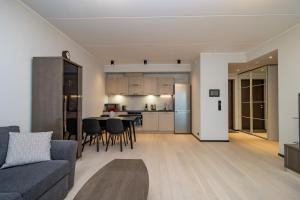Posezení v ubytování Cozy apartment by the Baltic Sea + 9 fotografií